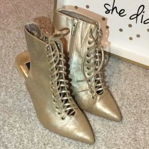 Gold pointy toe booties